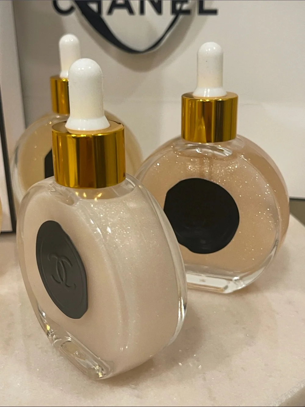 CHANEL Illuminating Shimmering Body Oil Fragrance Drop Bottles.